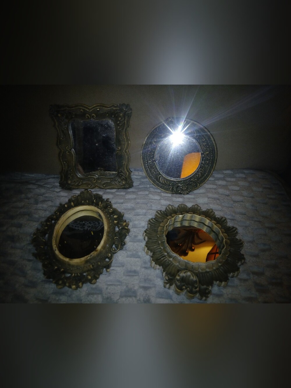 Set Of 4 Small Decorative Mirrors. I Believe Its A Resin Material.